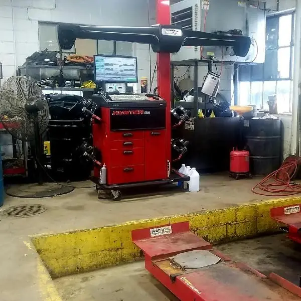 The Hunter alignment rack in one of the Guaranty Auto bays