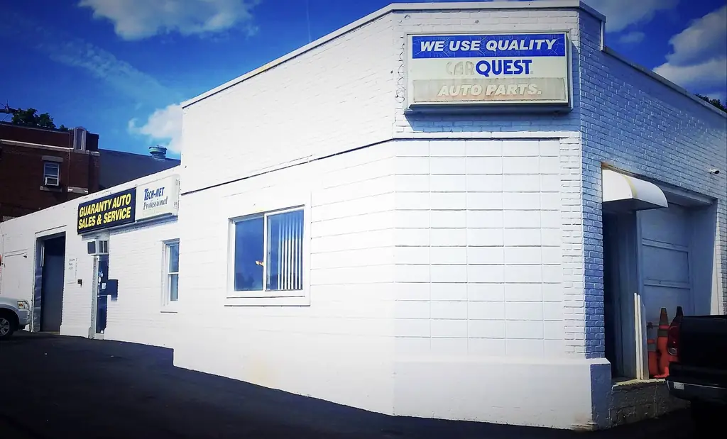 The Guaranty Auto Sales & Service storefront on Chestnut Street in Clinton, MA